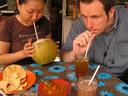 Nothing beats cold drinks at one of KLs hundreds and hundreds of streetside restaurants. Wai Leng drinks from a coconut, Jamison some lime tea, and our Milo ice sits chilling.